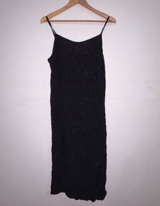 Black shiny polka dot dress