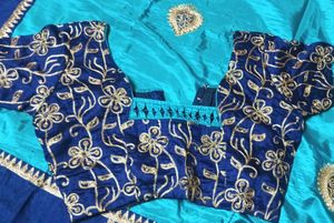 Beautiful Turquoise Saree with Gold Embroidery