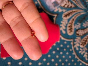 beautiful orange color nosepin  gold