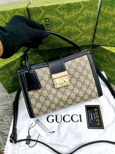 GUCCI* *PADLOCK BAG FEATURING THE ICONIC GG