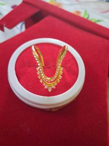 Elegant Gold Ring with Sparkling Stones