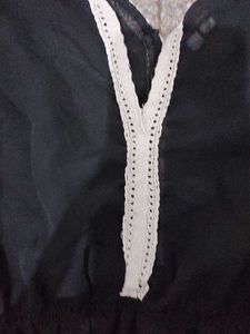 Chic Black Lace Trimmed Tunic Top