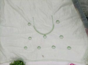 Elegant Mint Green Embroidered Saree
