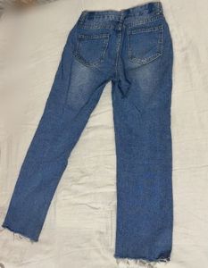 Distressed Blue Denim Jeans