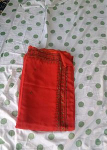 Elegant Red Saree with Gold Embellishments