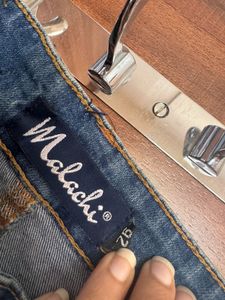 Ripped Flare Jeans