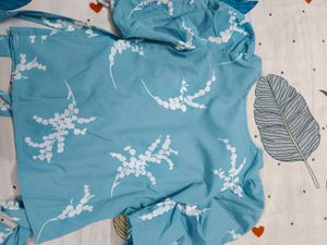 Sky Blue Floral Peplum Top with Puff Sleeves | Onc