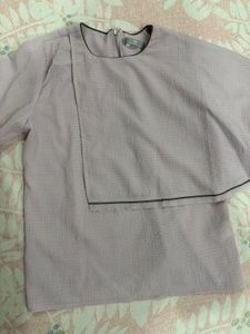 Elegant new rareism top