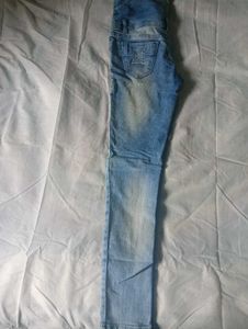 Distressed Blue Denim Jeans