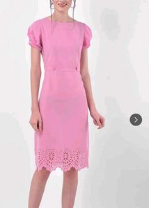 Chic Pink Midi Dress with Cutout Hem