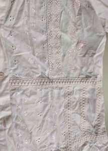 light pink schiffli top with weave and embroidery