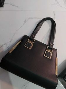2 Chic Black Handbag with Gold Accents