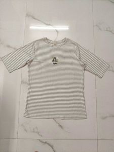 stripped off white top with thread embroidery