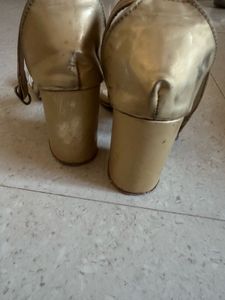 Elegant Gold Ankle Strap Heels