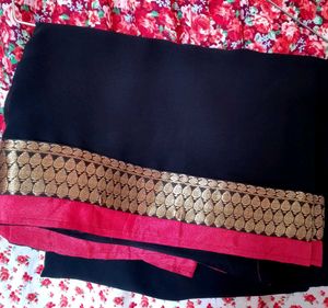 Elegant Black Saree with Gold & Pink Border