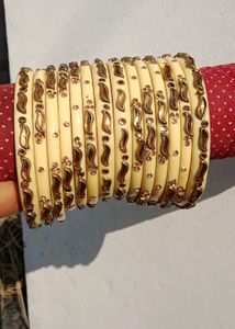 Elegant Cream Bangles with Gold Embellishments