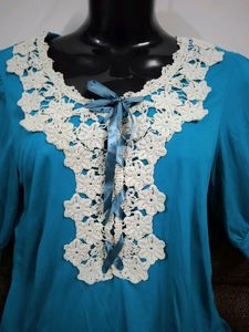 Cute Top ,there Is One Small Black Dot Below The Top But Not So Visible .you Can See In The Last Pic .if U Tug N Wear It Looks Amazing .