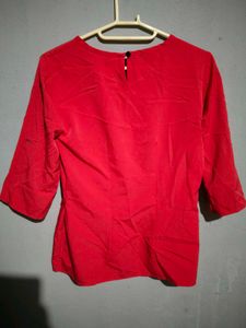 Elegant Red Top with Black Lace Accent