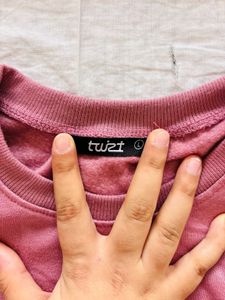 pink sweatshirt