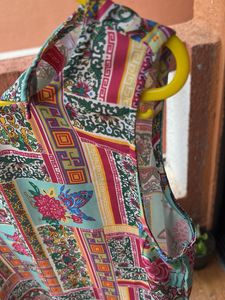 Vibrant print Sleeveless Dress with pock
