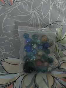 Bag of colorful glass marbles