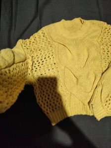 Yellow knitted sweater