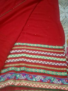 Embroidered Red Saree with Green Blouse