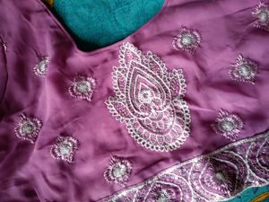 Georgette saree eith blouse..border and design...Pink in colour..