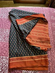 Elegant Black Saree with Orange Border