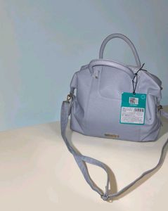 Caprese Peach satchel medium dull blue handbag