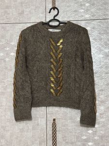 Zara sweater with gold-tone embellishments.
