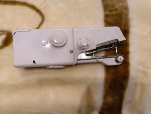 Handy Stitch Handheld Sewing Machine