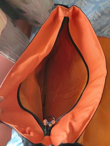 Black and orange bag with adjustable straps