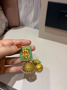 Exquisite Jhumka Earrings with Green Detail