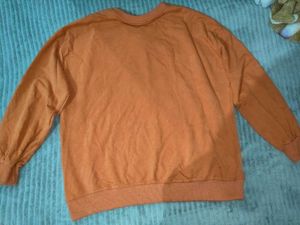Graphic Orange Sweatshirt