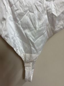 Elegant White Satin Bodysuit with Lace