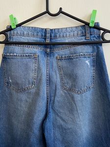 Torn high-waisted Wide Leg Jeans