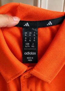 Adidas Orange Polo Shirt