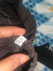 Stylish Black Pants with Decorative Buttons