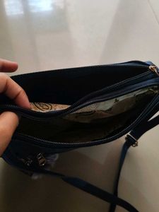 Stylish Blue Crossbody Bag with Pom-Pom