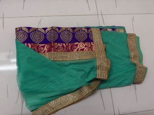Magenta Net Lehenga Choli with duptta
