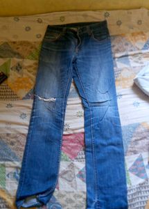 Distressed Blue Denim Jeans