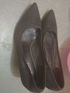 pointed-toe semi-sheer mesh trend.