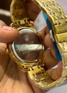 Gold Rolex Oyster Perpetual Watch