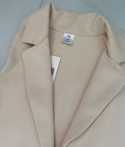 Chic Beige Vest and Wide Leg Pants co-ords set