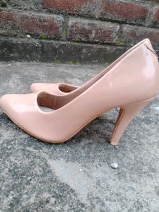 Elegant Nude Patent Leather Stilettos