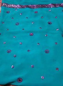 Stunning Teal Saree with Embellishments
