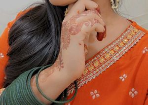 Elegant Orange Kurta Set with Intricate Embroidery
