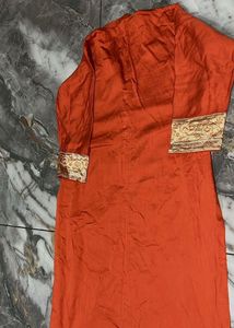Orange Embroidered Kurta and skirt
