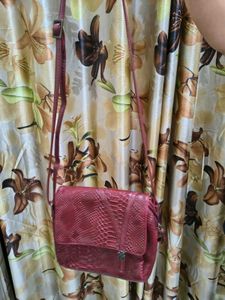 Stylish Baggit Brand maroon colour Crossbody Bag